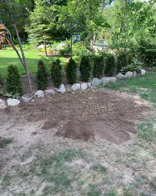 Landscaping area after the wide stump was ground down